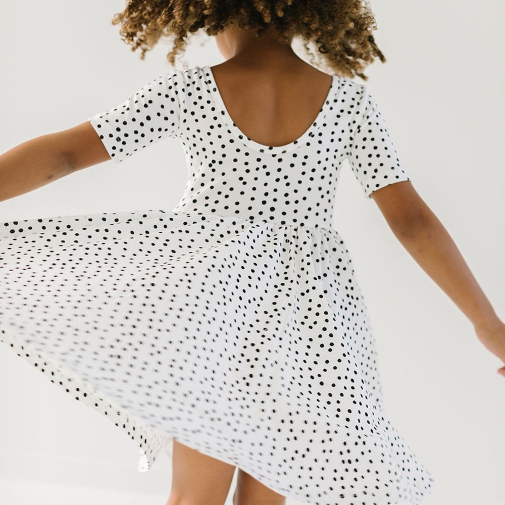 THE SHORT SLEEVE BALLET DRESS IN IVORY DOT